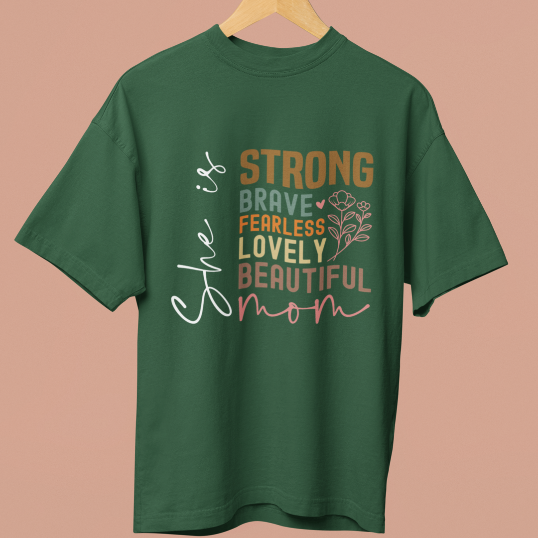 She Is Mom: A Celebration of Strength and Beauty Oversized TShirt